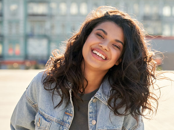 Manhattan Bridge Orthodontics girl with nice teeth smiling