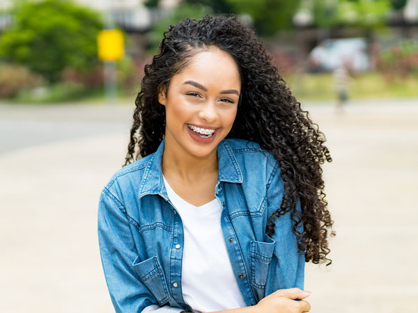 Manhattan Bridge Orthodontics Smiling girl with braces